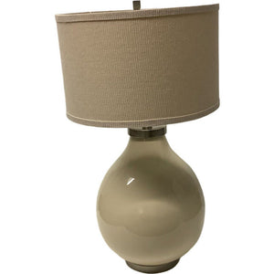 Round cream lamp with tan shade