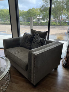 Taupe velour oversized chair gray paisley pillow